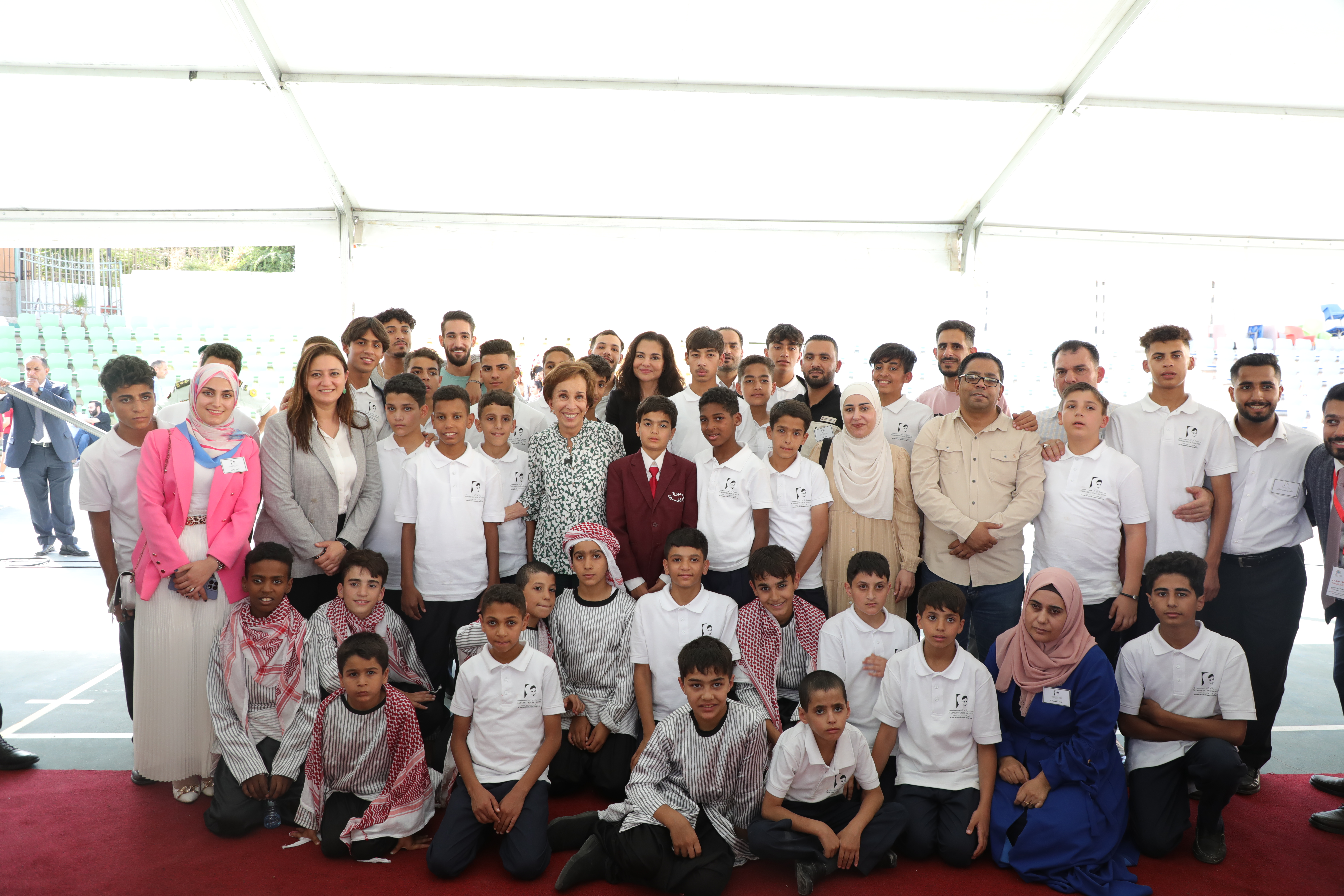 Group photo with Mabarrat Um Al Hussein Family